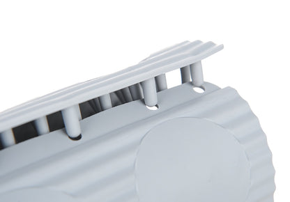L'insert de brosses souples se retire du gobelet